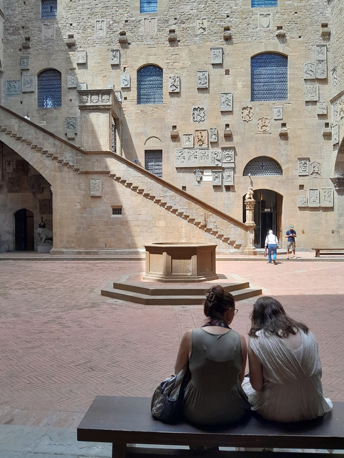 Enjoying the calm atmosphere in the Bargello Museum courtyard Relaxing on the benches in the peaceful courtyard of the Bargello Museum in Florence