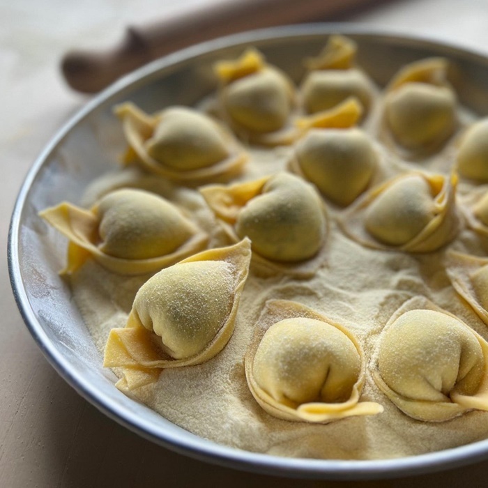 Freshly made cappelacci pasta prepared during Francy's hands-on cooking class in the Florentine hills