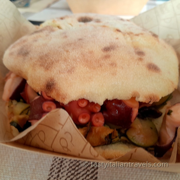 Puccia filled with octopus and zucchini, traditional Apulian sandwich
