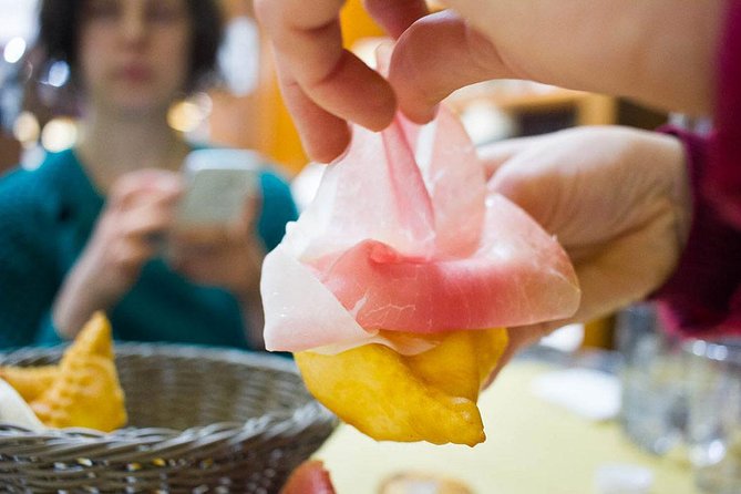 You'll be tasting delicious cured meats on this Parma food tour