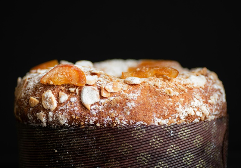 Best Panettone in Italy – Traditional Italian Christmas Bread Best panettone in Italy featuring a soft, fluffy crumb, candied orange peel, sliced almonds, and a classic domed crust