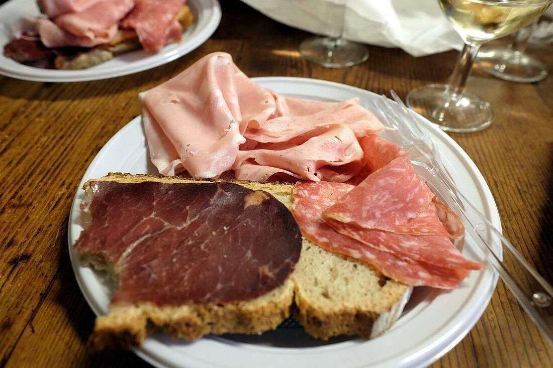 Cured Meats Tasting on the Classic Bologna Food Tour – Mortadella, Salami, and Bresaola Selection of mortadella, salami, and bresaola served during the Classic Bologna food tour