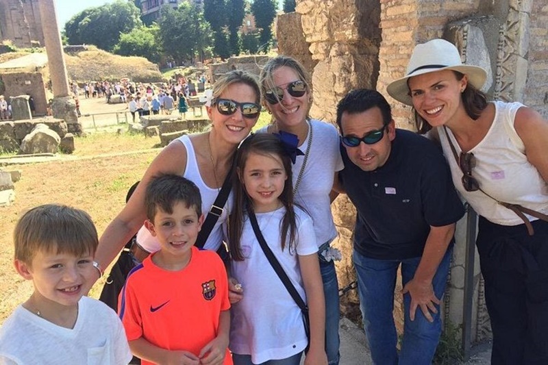 Kids and parents enjoying a family-friendly Colosseum tour with LivTours in Rome