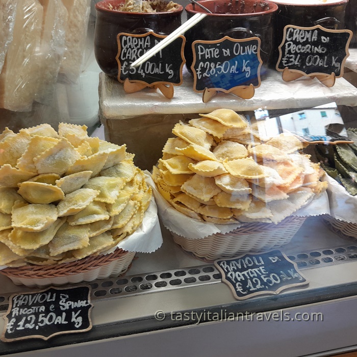 Fresh handmade ravioli on display at Sant’Ambrogio Market, a must-see stop for Florence for foodies