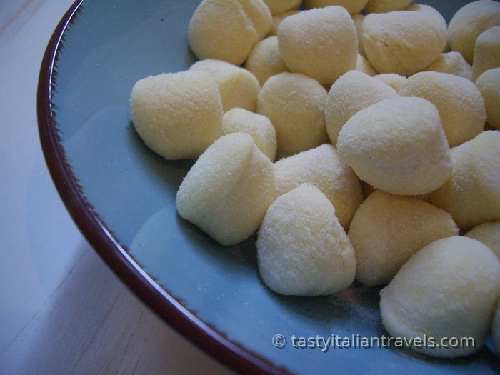 Fresh gnocchi from a local pastificio in Italy — a delicious highlight of our travels Fresh handmade Italian gnocchi we bought from a tiny pastificio in Italy — one of the best meal choices from our trip