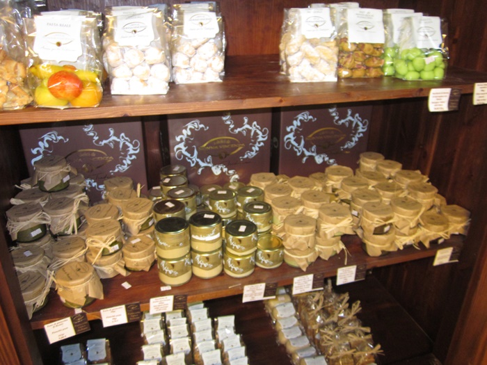 Sicilian Foodie Gifts at I Dolci di Nonna Vincenza Cupboard filled with traditional Sicilian sweets and gourmet gifts at I Dolci di Nonna Vincenza