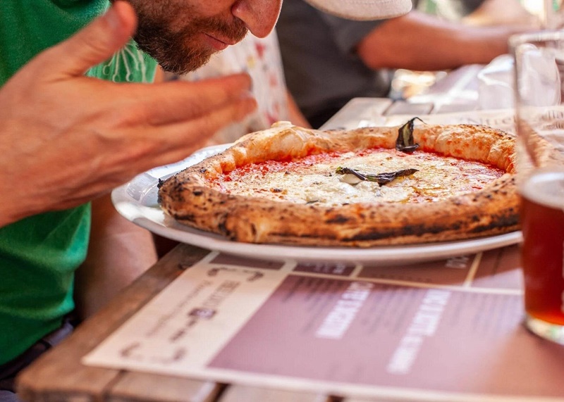 Wood-fired Pizza Margherita on an Eating Europe Food Tour in Naples Wood-fired Pizza Margherita enjoyed on an Eating Europe food tour in Naples