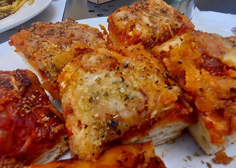 Sfincione â Sicilian street food on an Italy food tour Sfincione, traditional Sicilian street food enjoyed on an Italy food tour