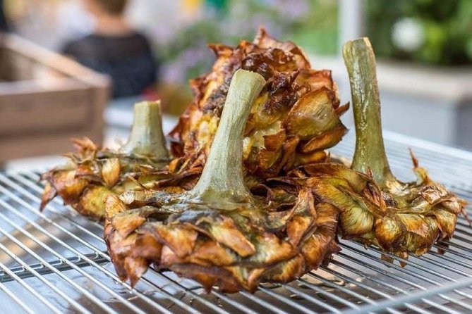 During our food tour in Romeâs Jewish Ghetto, we tried carciofi alla giudia â perfectly crisp, golden fried artichokes and a true local specialty Crisp fried artichokes served on a plate during a food tour in Romeâs Jewish Ghetto