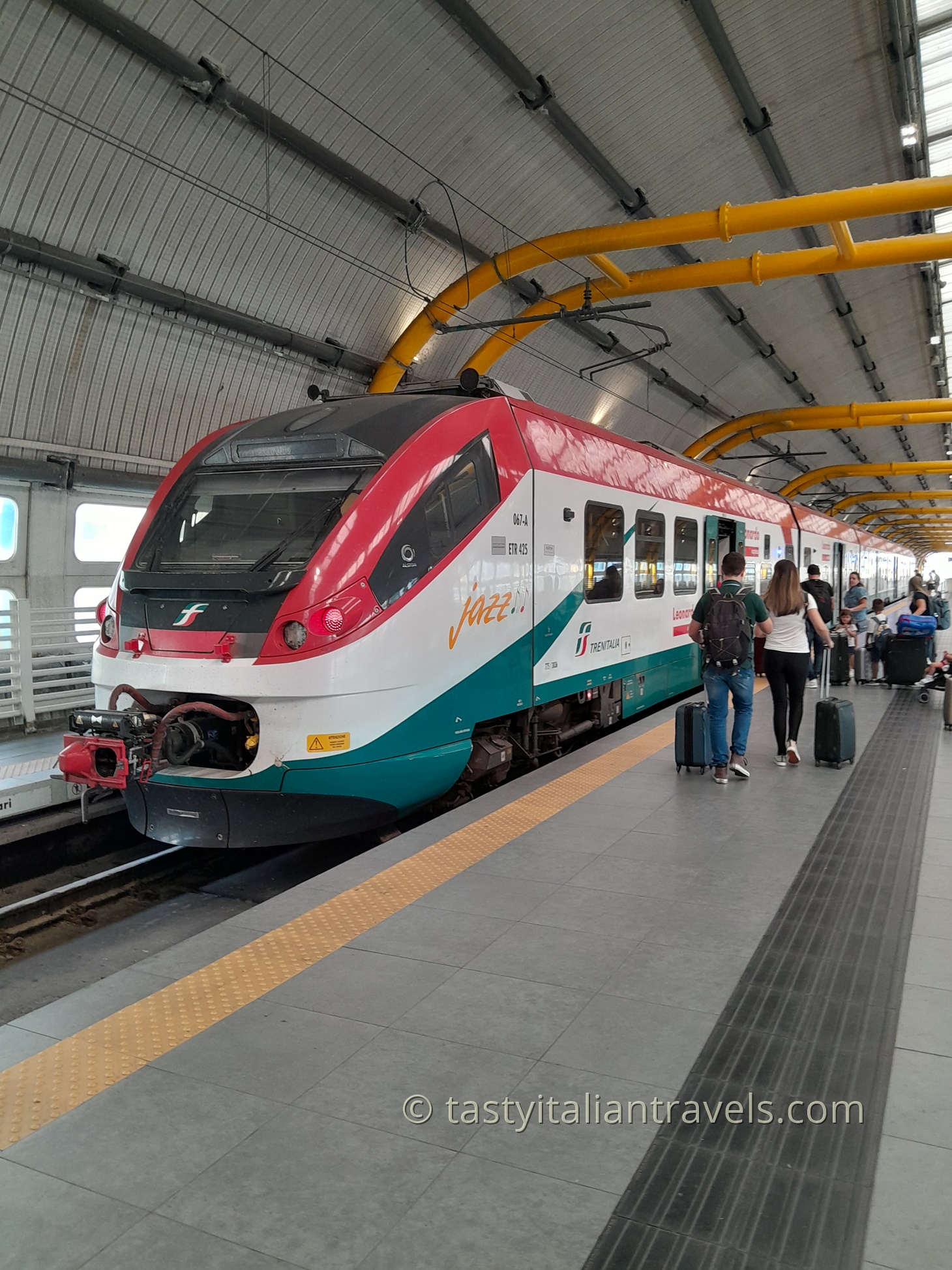 Modern Leonardo Express train at platform connecting Rome Fiumicino Airport and city center