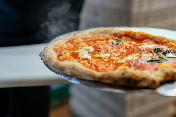 You'll enjoy the scent and taste of freshly baked Neapolitan pizza on this Naples food tour! You'll enjoy the scent and taste of freshly baked Neapolitan pizza on this Naples food tour!