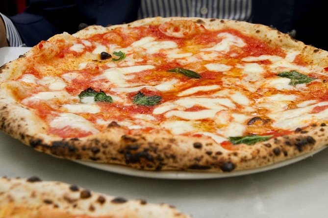 Neapolitan pizza features a thin, soft crust that is slightly chewy and is typically topped with San Marzano tomatoes, fresh mozzarella cheese, fresh basil, and a drizzle of olive oil. Neapolitan pizza features a thin, soft crust that is slightly chewy and is typically topped with San Marzano tomatoes, fresh mozzarella cheese, fresh basil, and a drizzle of olive oil.