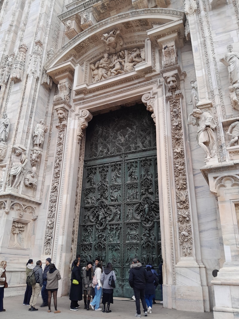 Duomo's central door are themed around stories from the life of Mary Duomo's central door are themed around stories from the life of Mary