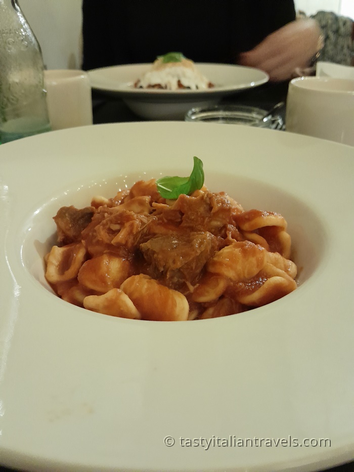 A plate of orecchiette al ragù pugliese served at Il Vicoletto Trattoria in Monopoli, Italy