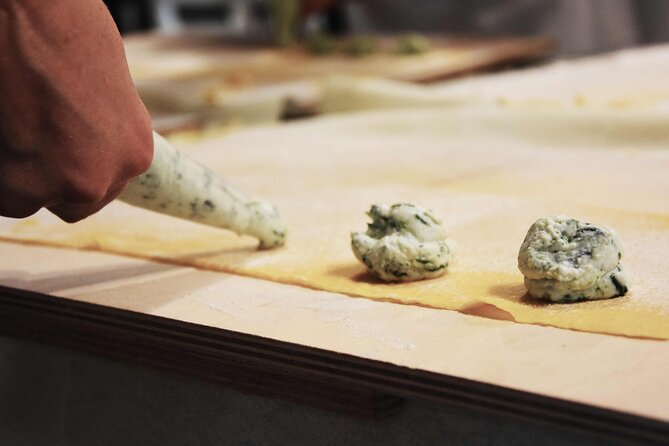 Ravioli Making Class in Rome â Learn to Make Fresh Pasta by Hand Close-up of hands making fresh ricotta ravioli during a pasta class in Rome near the Vatican