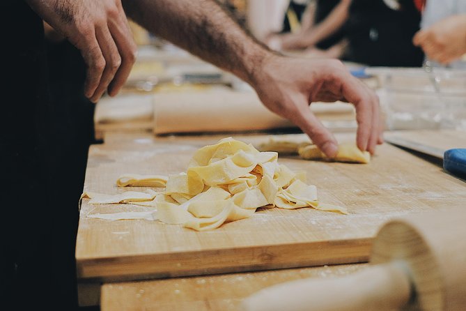 Hands-On Pasta Making Class in Frascati, Italy Guests making fresh pasta during a small-group cooking class in Frascati near Rome, Italy
