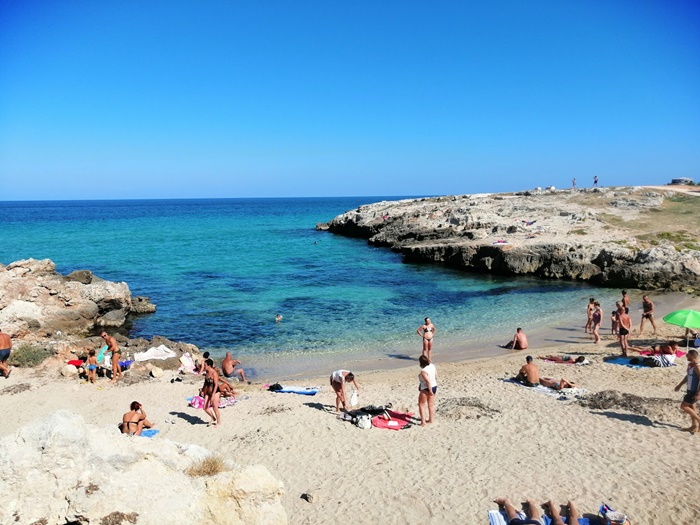 Porto Bianco – sandy beach close to Monopoli’s historic center Sandy Porto Bianco beach with clear water in Monopoli