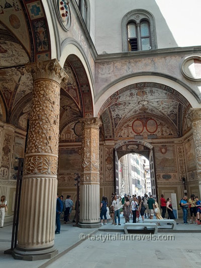 Stepping into the beautiful courtyard of Palazzo Vecchio in Florence, with colorful frescoes, grand arches, and elegant columns—and it’s completely free to visit
