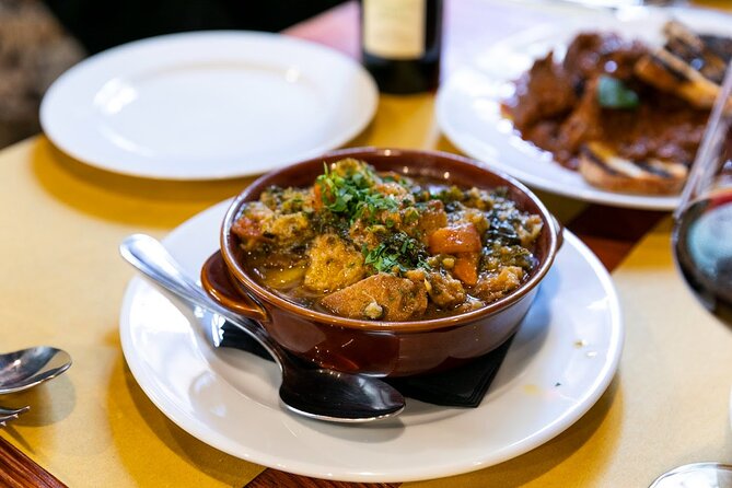 Bowl of traditional Tuscan wild boar ragù (ragù di cinghiale), served with pasta during the Secret Food Tour in Florence