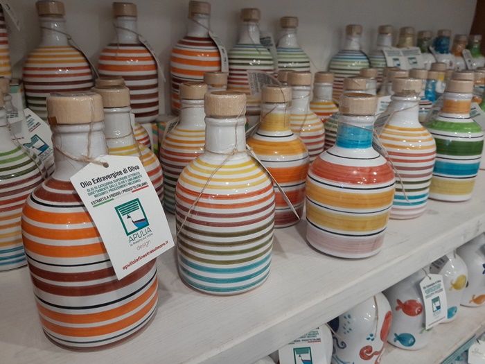 Hand-painted ceramic "orcio" filled with olive oil — a perfect souvenir from Puglia