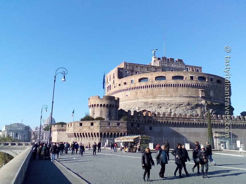 Tourists exploring the Castel Sant’Angelo area in Rome during winter